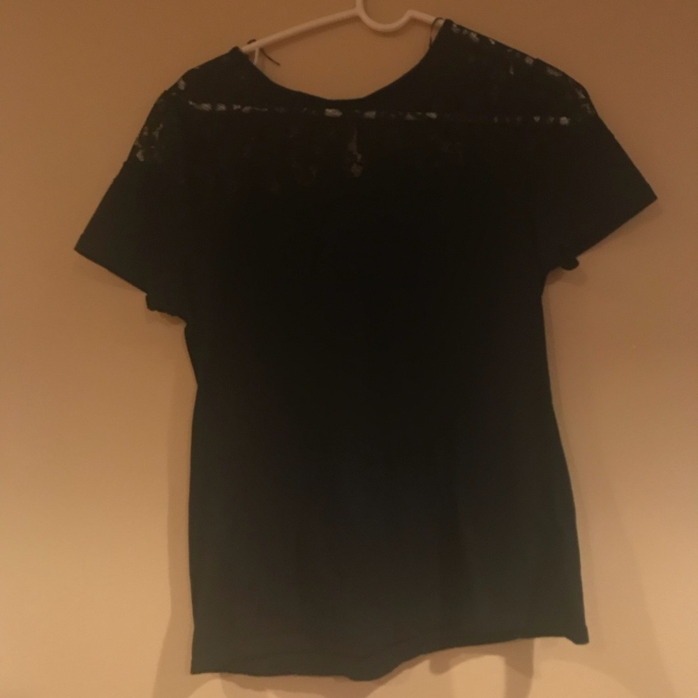 Black shirt with lace on top.
